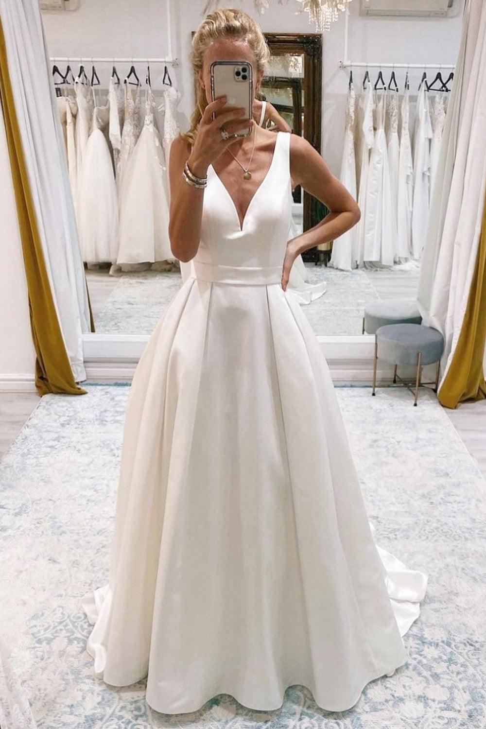 Chic Ivory A-Line Deep V-Neck Long Beach Wedding Dress with Bowknot