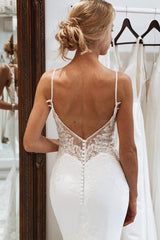 Elegant Backless White Mermaid Lace Beach Wedding Dress with Button Accents