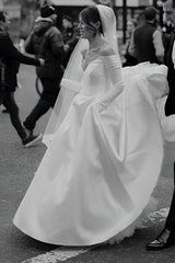 Off-The-Shoulder Wedding Dresses with Elegant Ball-Gown Long Sleeves