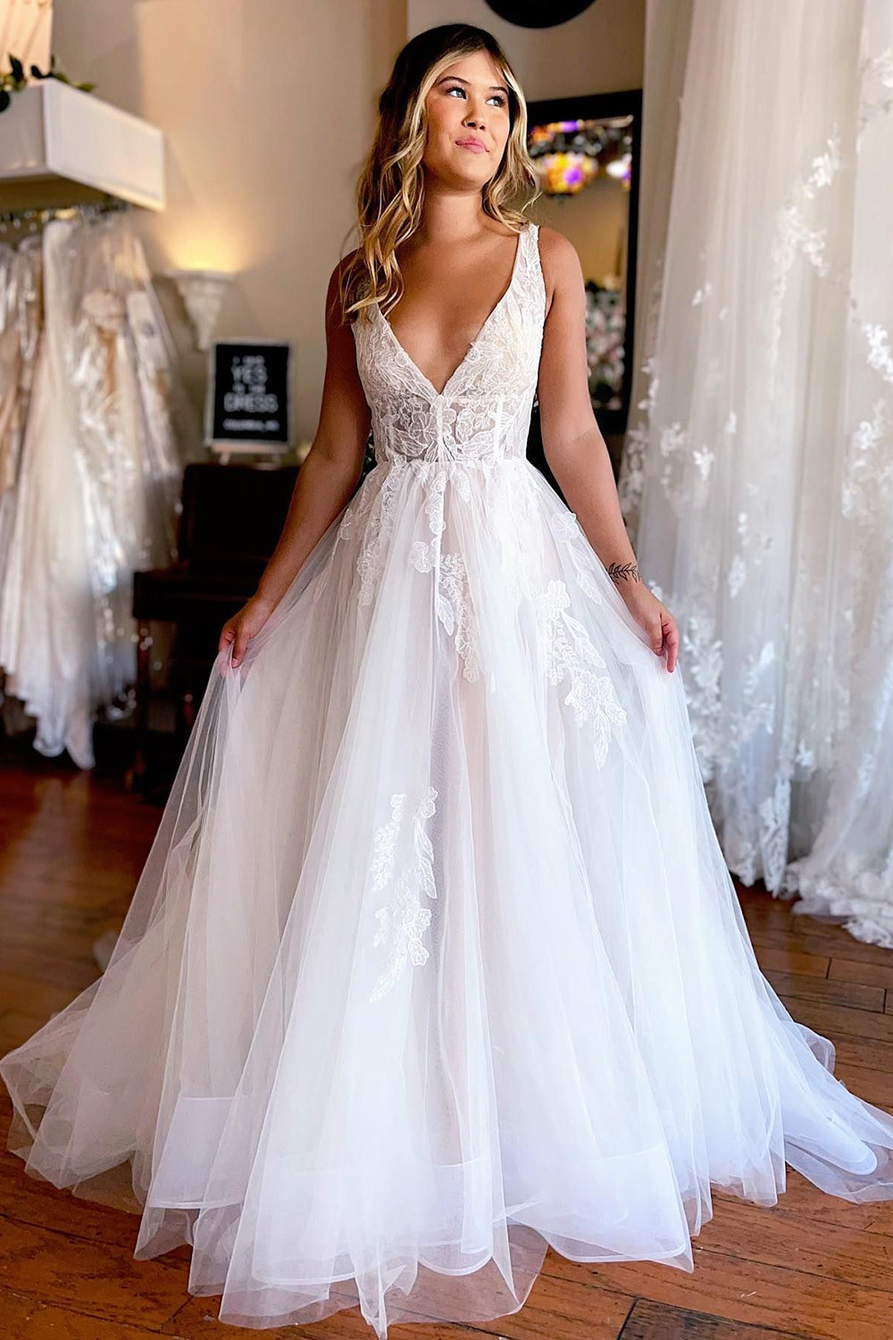 Stylish Ivory A-Line Deep V-Neck Backless Long Wedding Dress with Lace