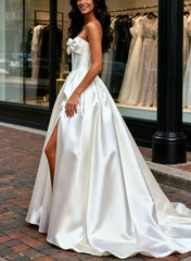 A Line Strapless Sleeveless Court Train Satin Wedding Dress with Bow Beading and High Slit