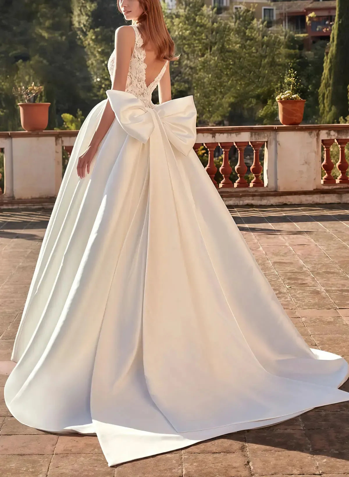 Ball Gown Plunge Neck Sleeveless Court Train Satin Wedding Dress with Bow Pockets and Appliques