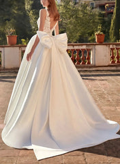 Ball Gown Plunge Neck Sleeveless Court Train Satin Wedding Dress with Bow Pockets and Appliques