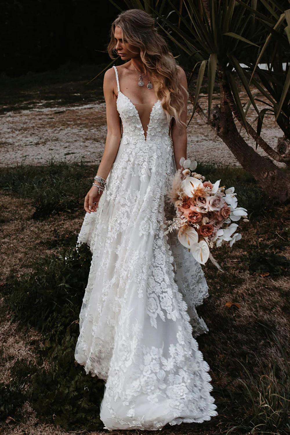 Bohemian White A-Line Beach Wedding Dress Adorned with Appliques