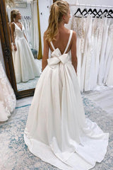 Chic Ivory A-Line Deep V-Neck Long Beach Wedding Dress with Bowknot