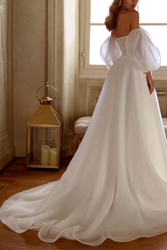 Elegant Organza Wedding Dress with Beading and A-Line Silhouette