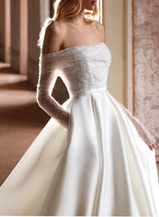 Off-The-Shoulder A-Line Beach Wedding Dress With Long Sleeves and Pockets Featuring Sequins